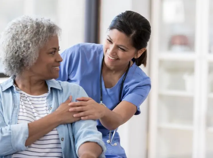 Home care services Darling Point Sydney with carer supporting an older woman at home