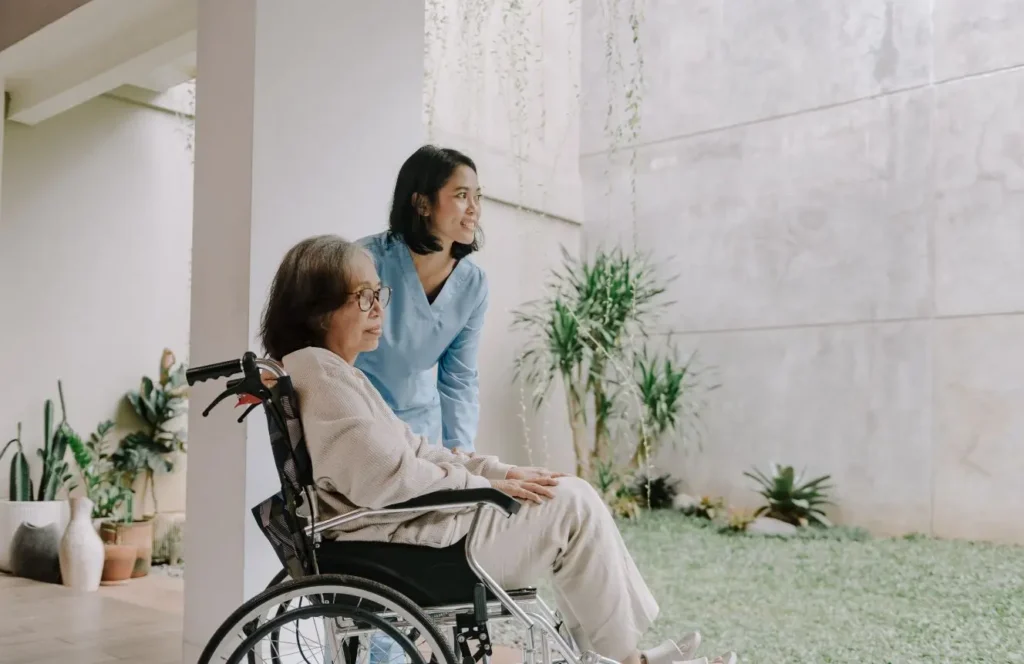 Nurse practitioner conducting a home visit for an elderly resident in Vaucluse