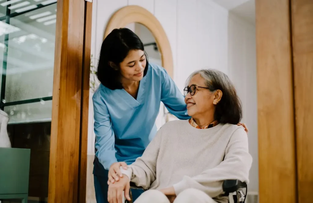 Registered nurse providing nursing care to senior at home in Point Piper Sydney