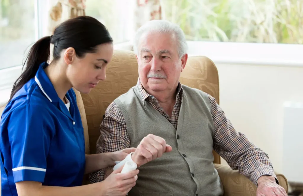 Registered nurse performing wound care and dressing at home in Bankstown Sydney